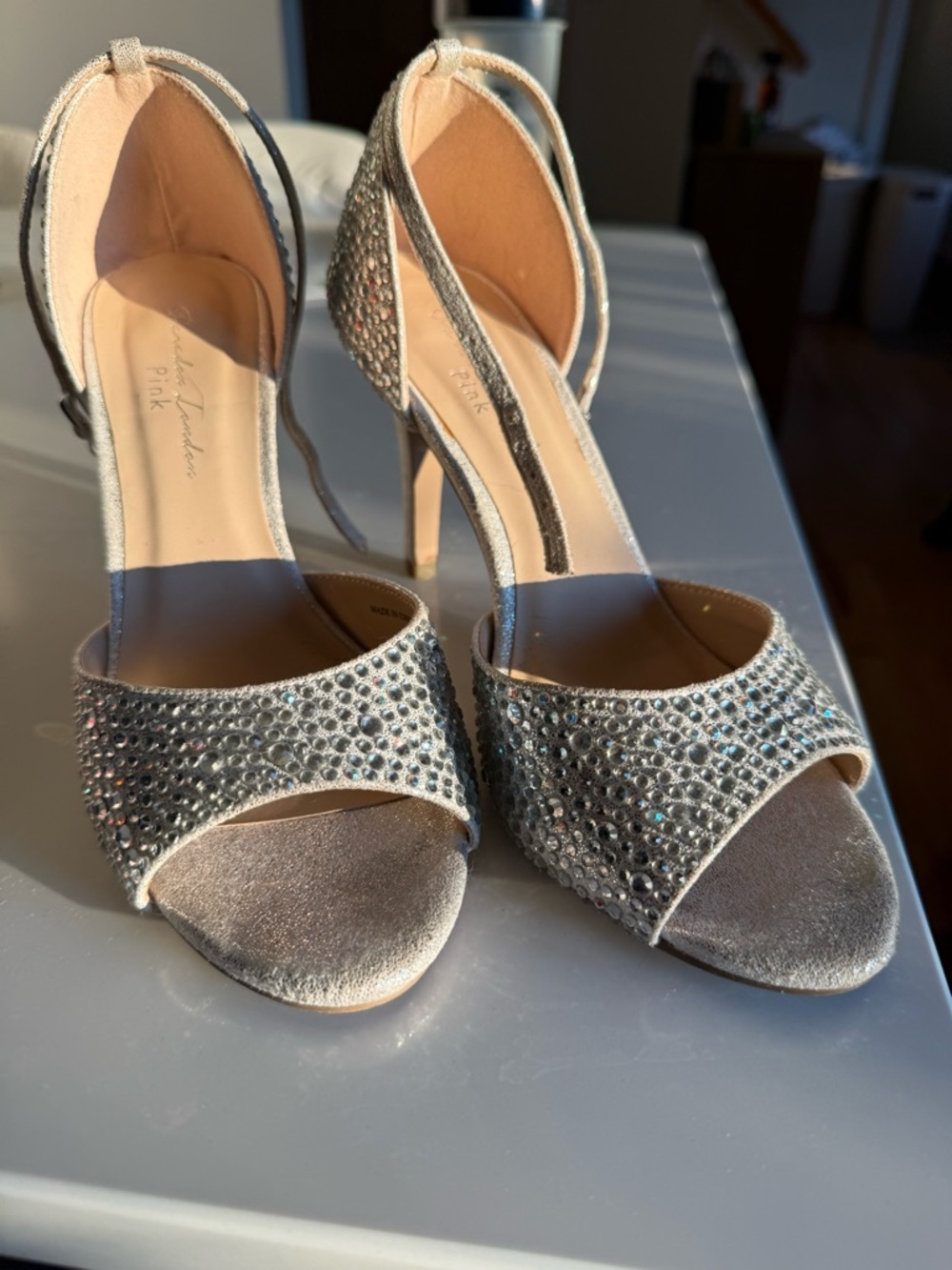 Size 7, silver glitter Mira heels